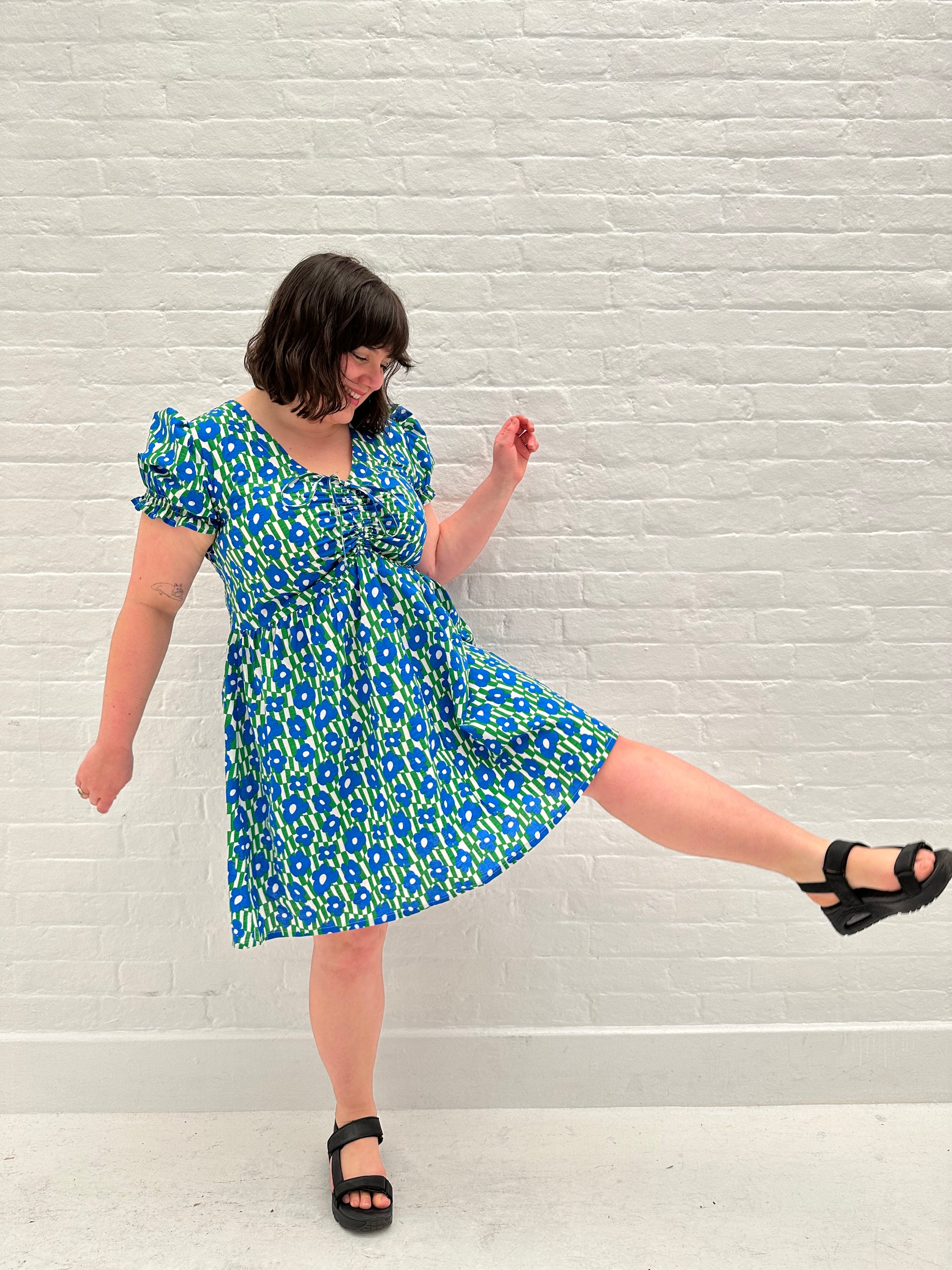 Adjustable front mini dress size L
