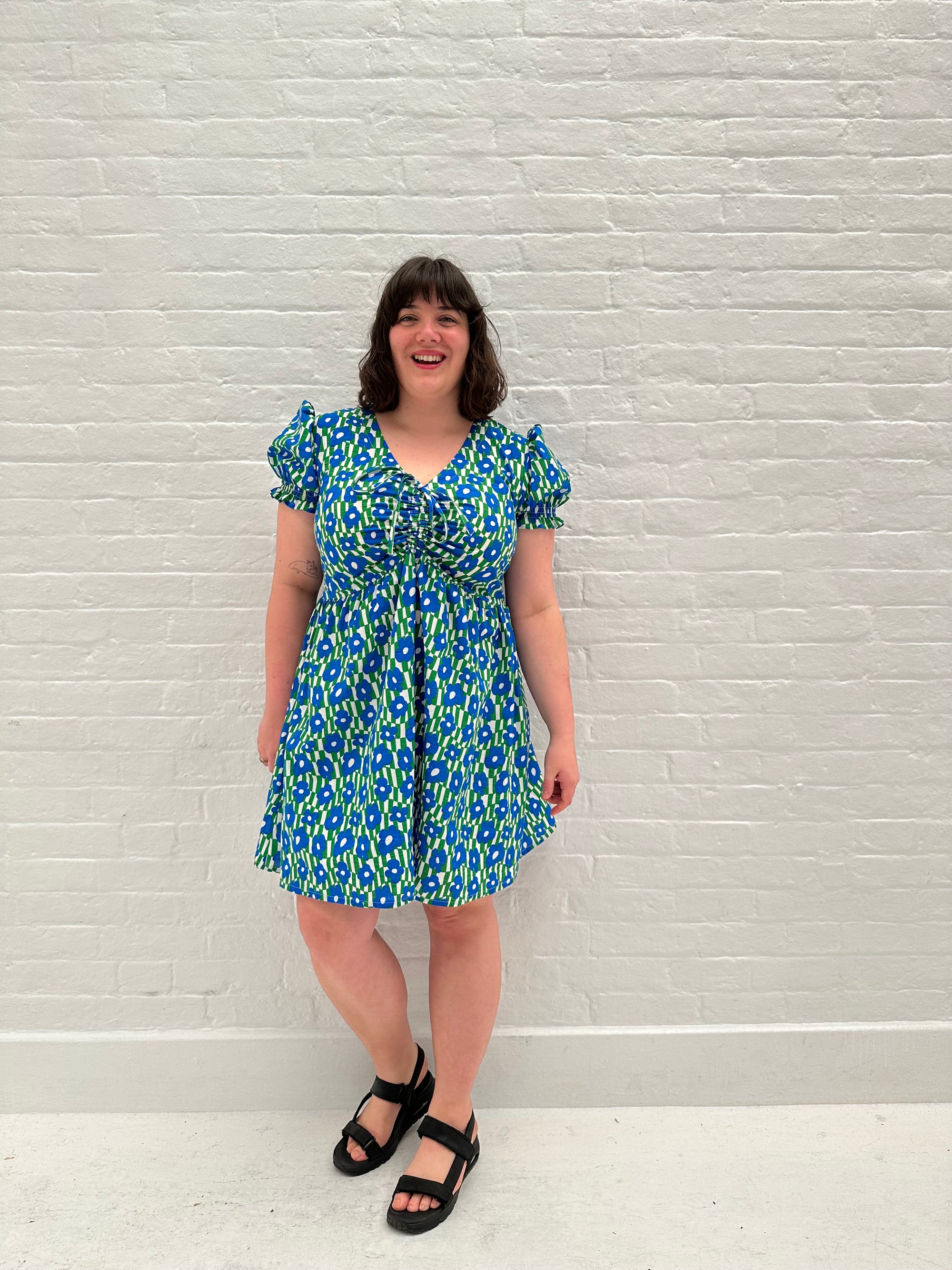Adjustable front mini dress size L